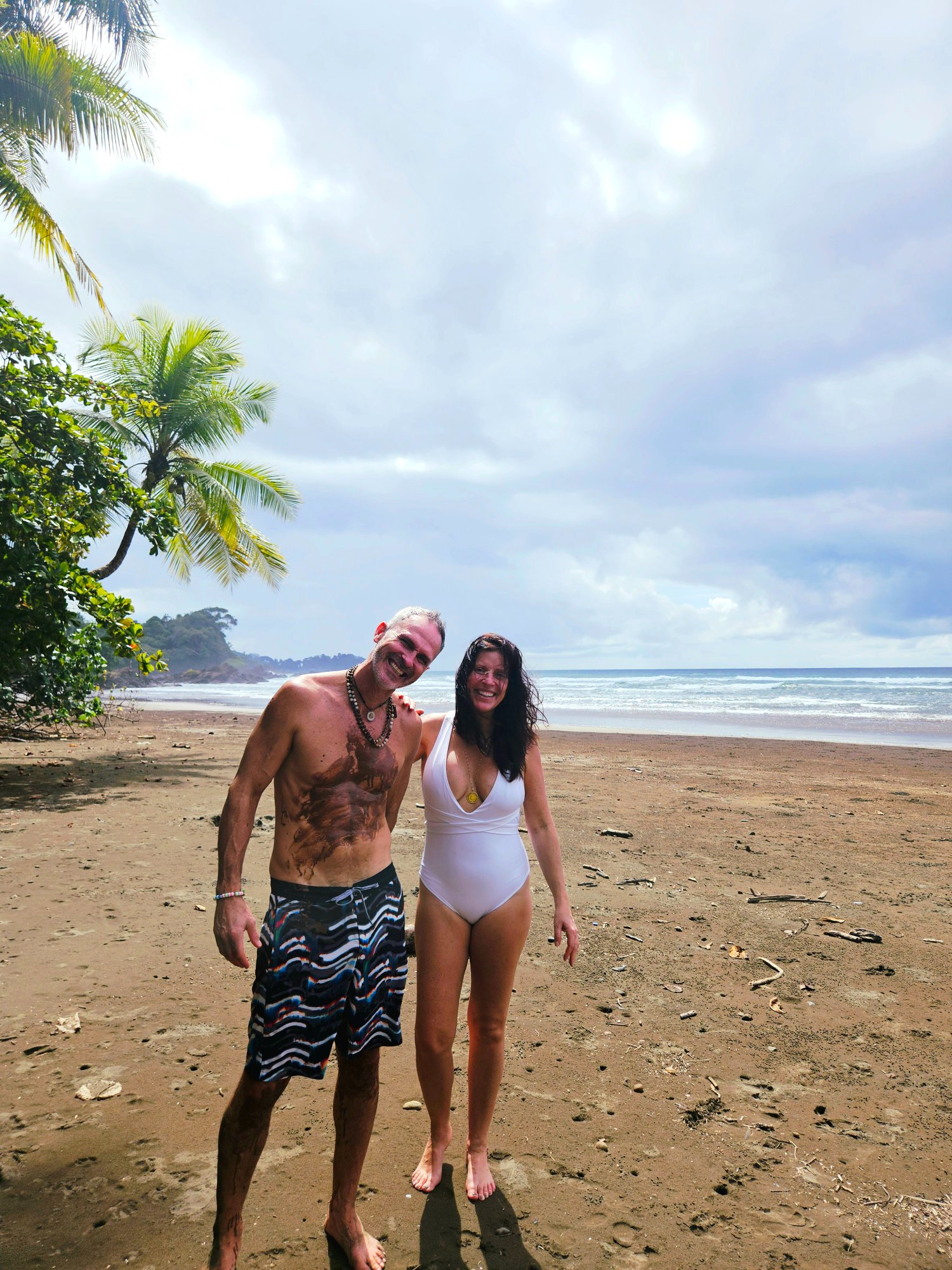 Couple at the Pacific coast during retreat beach day